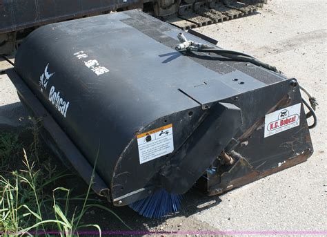 bobcat skid steer sweeper attachment|bobcat sweeper attachment price.